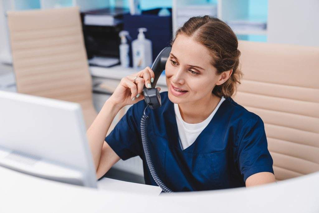 woman on phone supporting student